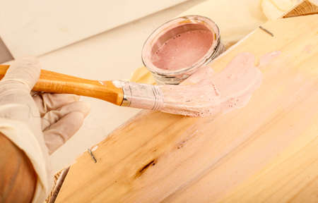 Be painted a wooden box with a brushの写真素材