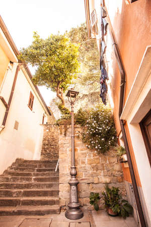 Calli and architectural details of the Istrian-Venetian town,Muggia, Trieste, Italy