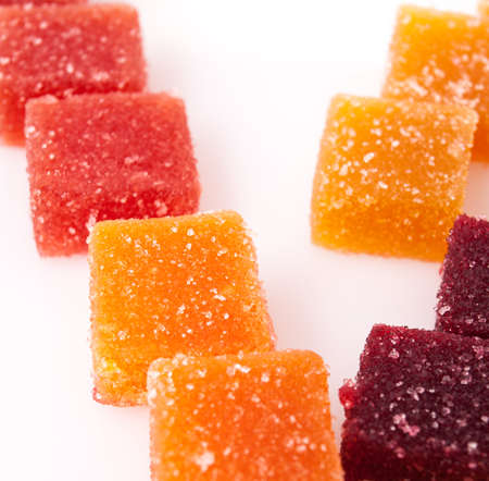 Candy jelly cubes in studio on white background.