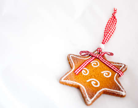 Christmas cookie ornament on a white background, suitable for greeting card.の写真素材