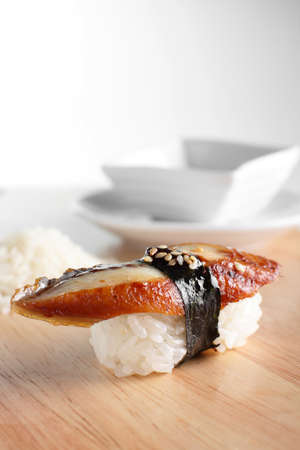 fresh and tasty sushi on bright backgroundの写真素材
