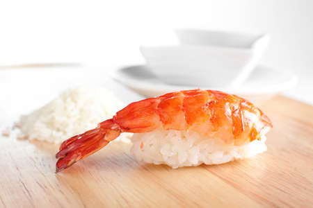fresh and tasty sushi on bright backgroundの写真素材