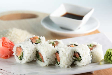 fresh and tasty sushi on bright backgroundの写真素材