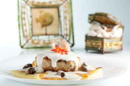Hot and tasty beaf on white dishの写真素材