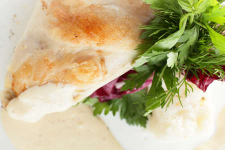 hot and tasty roasted meat on white dishの写真素材