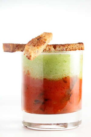 fresh and tasty soup with bread on the cupの写真素材