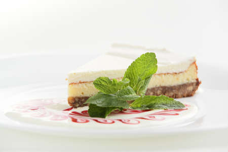 fresh and tasty cake on white dish and white backgroundの写真素材