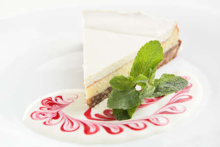 fresh and tasty cake on white dish and white backgroundの写真素材