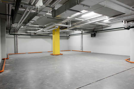 empty grey parking with colored elements without carsのeditorial素材