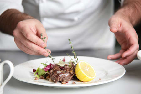 Fresh and tasty salad in white dishの写真素材