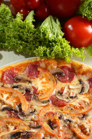 hot italian pizza with cheese and sauceの写真素材