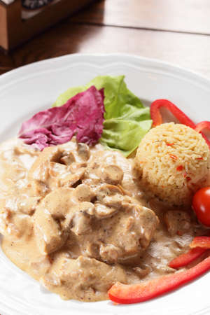 fresh and tasty peaces of meat with garnishの写真素材