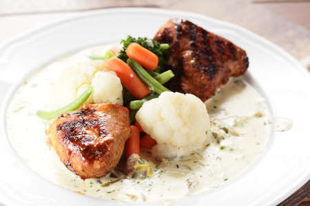 fresh and tasty peaces of meat with garnishの写真素材