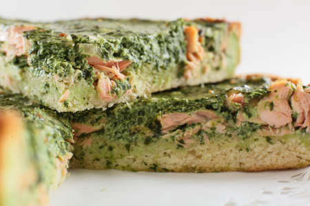 cold and tasty pie with fish and garnishの写真素材