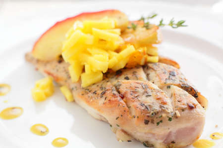 fresh and tasty peaces of meat with garnishの写真素材