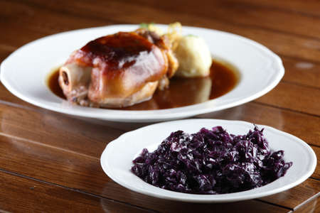 fresh and tasty peaces of meat with garnishの写真素材