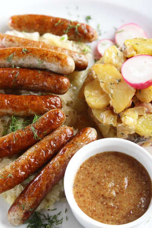 fresh and tasty peaces of meat with garnishの写真素材