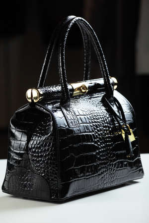 black bag on white tableの写真素材