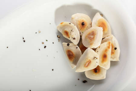 hot and tasty dumplings on a dishの写真素材