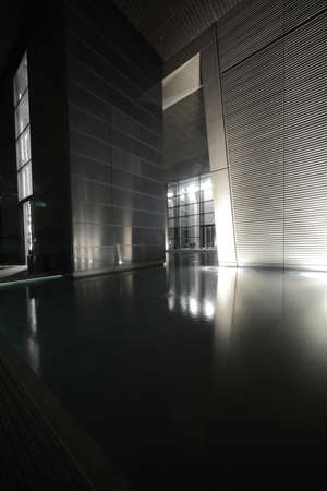 modern entrance to building with water in dubaiの写真素材