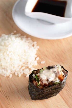 fresh and tasty sushi on bright background
