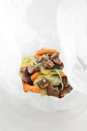 fresh and tasty peaces of meat with garnishの写真素材