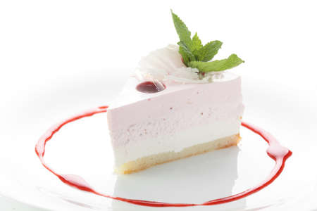sweet and tasty cake with mint on white background