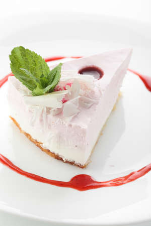 sweet and tasty cake with mint on white backgroundの写真素材