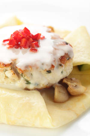 hot roasted meat in pancake with mushroomsの写真素材