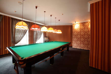 brand new and modern billiard interior in night time