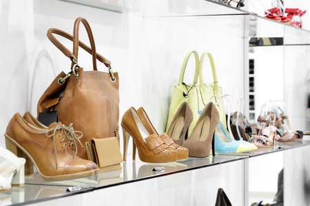 bright and fashionable interior of shoe store in modern mallの写真素材