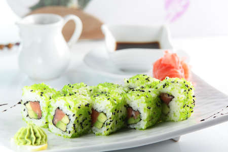fresh and tasty sushi on bright backgroundの写真素材