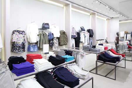 luxury and fashionable brand new interior of cloth storeの写真素材