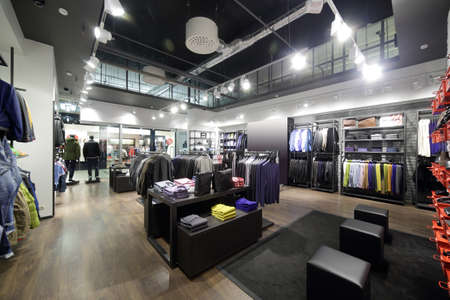 luxury and fashionable brand new interior of cloth storeの写真素材