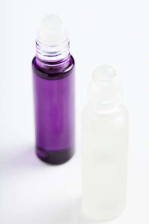 little transparent and cute parfume bottle on white backgroundの写真素材