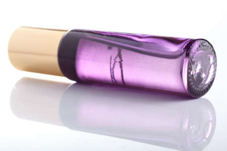 little transparent and cute parfume bottle on white backgroundの写真素材