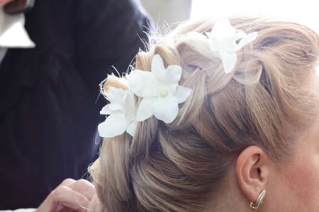 blond girl hair cut in european beauty salon