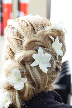 blond girl hair cut in european beauty salon