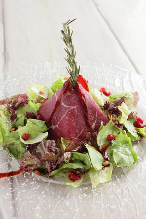 fresh and tasty meat on bright backgroundの写真素材