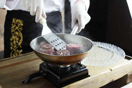 professional cooking process on a european kitchenの写真素材