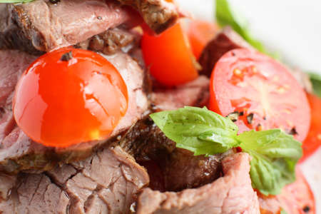 fresh and tasty meat on bright backgroundの写真素材