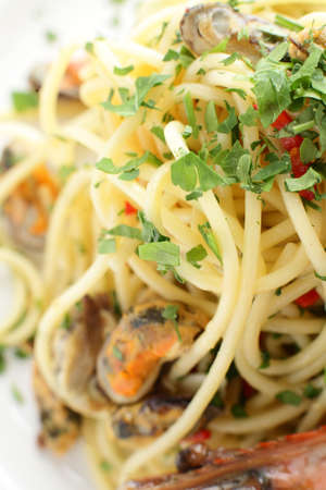 hot and tasty italian pasta on shite backgroundの写真素材