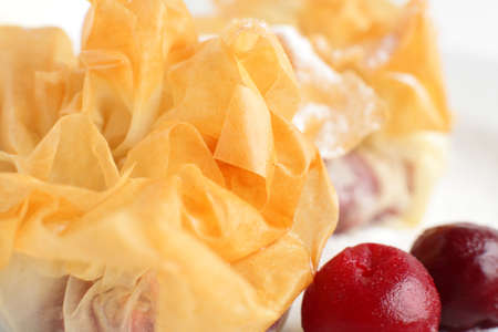 fresh and tasty peace of cake on white background