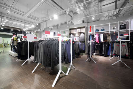 luxury and fashionable brand new interior of cloth storeの写真素材