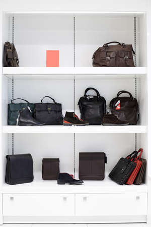 bright and fashionable interior of shoe store in modern mallの写真素材