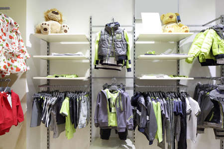 luxury and fashionable brand new interior of kids cloth storeの写真素材