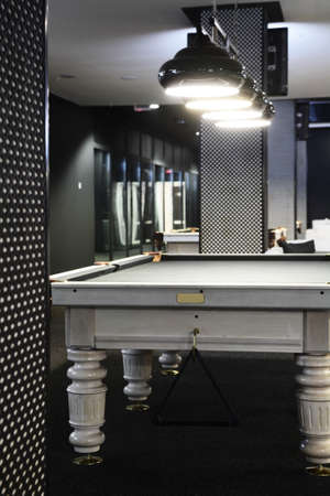 brand new and modern billiard interior in night time