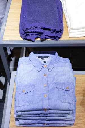 luxury and fashionable brand new interior of cloth storeの写真素材