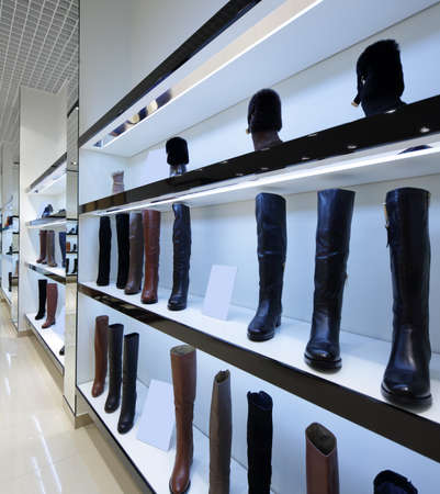 bright and fashionable interior of shoe store in modern mallのeditorial素材