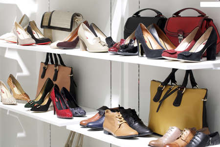 bright and fashionable interior of shoe store in modern mall